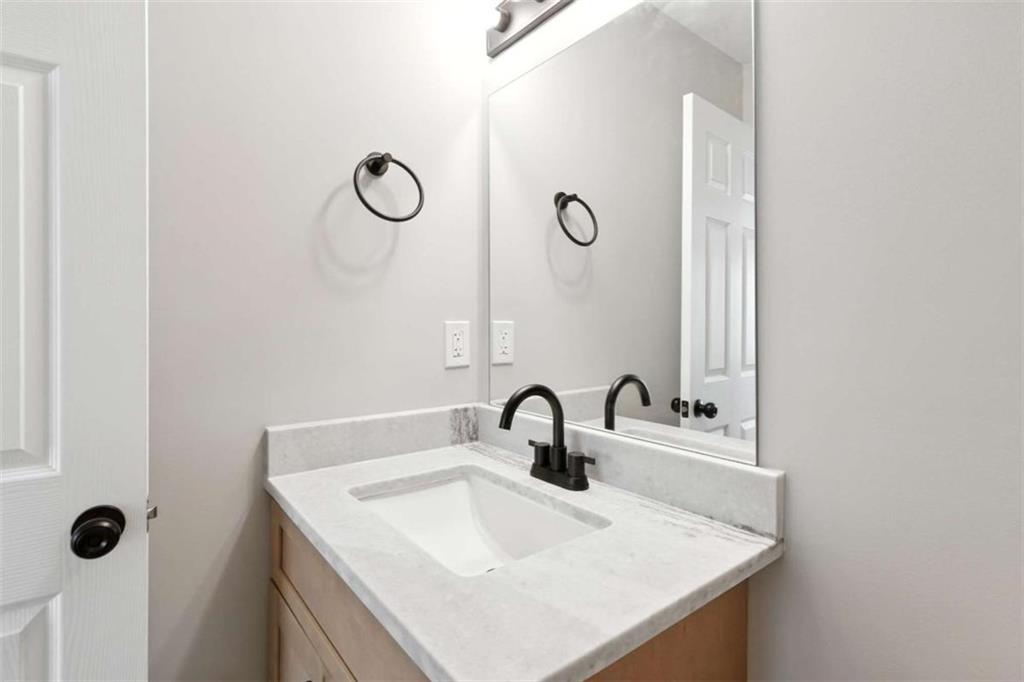 159 Brad Street Royston, GA 30662 - Photo 15 of 21 a bathroom with a sink and mirror