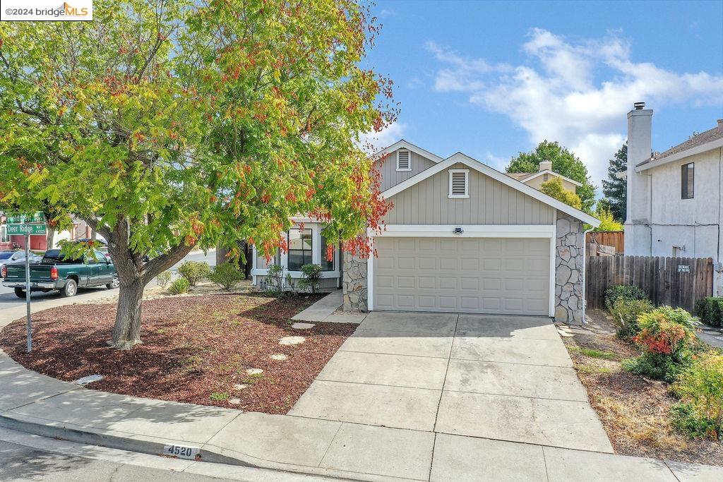 4520 Deer Ridge Way Antioch, CA 94531 - Photo 1 of 1 a front view of a house with a yard and garage