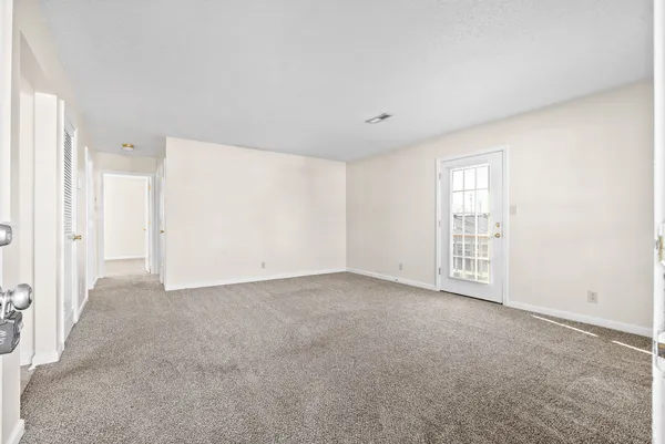 an empty room with windows