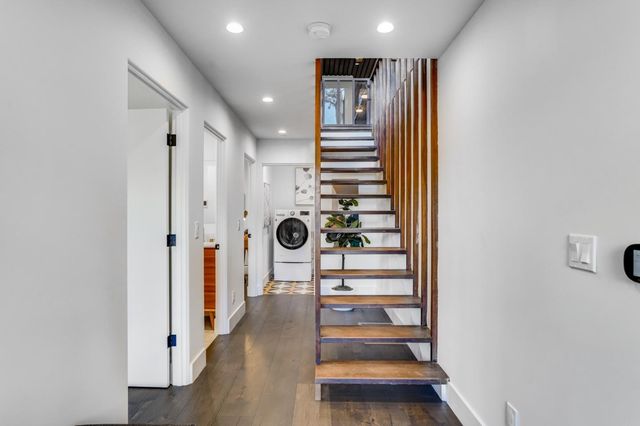 a view of entryway with a wooden door