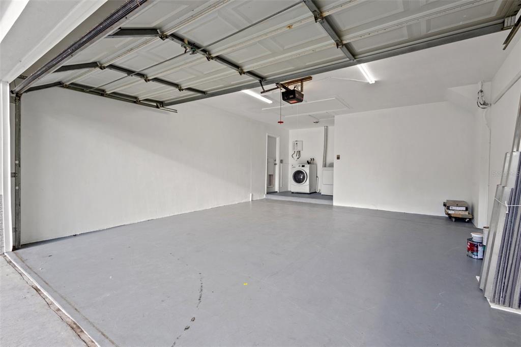 2033 Little Neck Road Clearwater, FL 33755 - Photo 29 of 39 Large two car garage with hurricane shutters