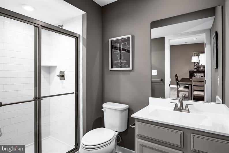 319 Ruffian Road Camp Hill, PA 17011 - Photo 18 of 18 a bathroom with a sink a toilet and shower
