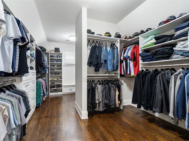 a bedroom with a bed and a cabinets