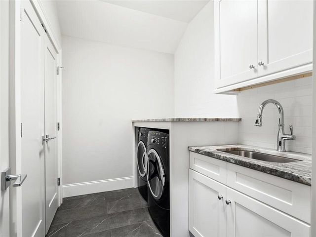 a bathroom with a sink a vanity and a mirror
