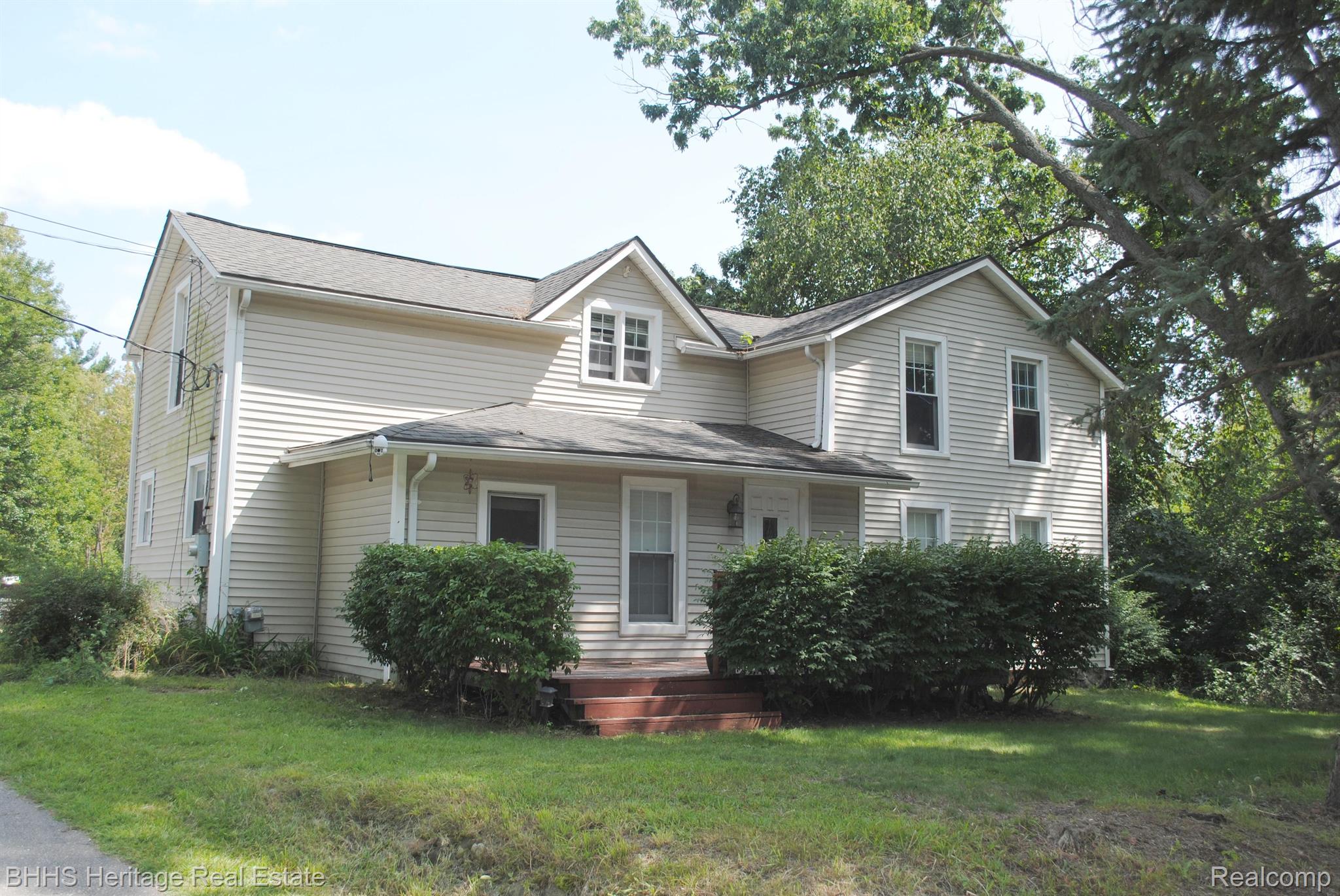 5004 Carroll Lk Road Commerce Township, MI 48382 - Photo 1 of 24 Welcome to your historic home in Walled Lake!