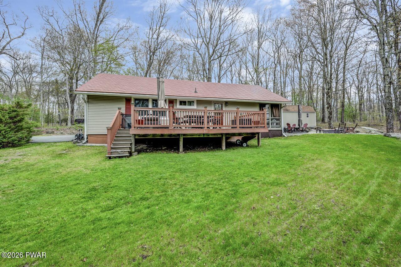 103 Forest Drive Hawley, PA 18428 - Photo 70 of 85 a view of a house with a yard and sitting area