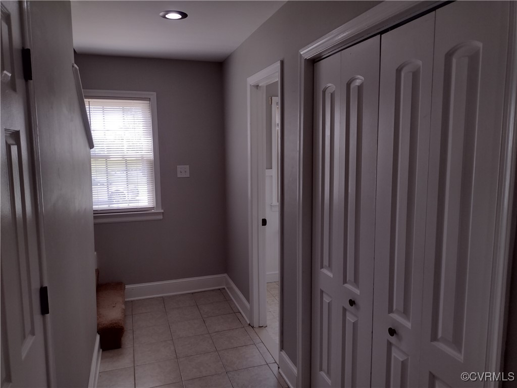 3249 Maidens Road Powhatan, VA 23139 - Photo 19 of 45 Hall with light tile patterned floors, baseboards,