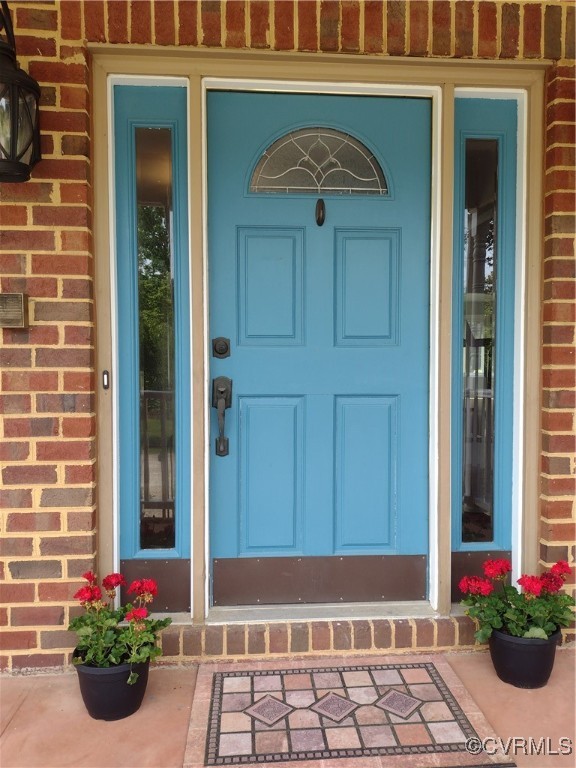 3249 Maidens Road Powhatan, VA 23139 - Photo 2 of 45 Doorway to property featuring brick siding