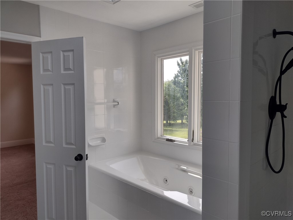 3249 Maidens Road Powhatan, VA 23139 - Photo 23 of 45 Full bath with plenty of natural light, a jetted t
