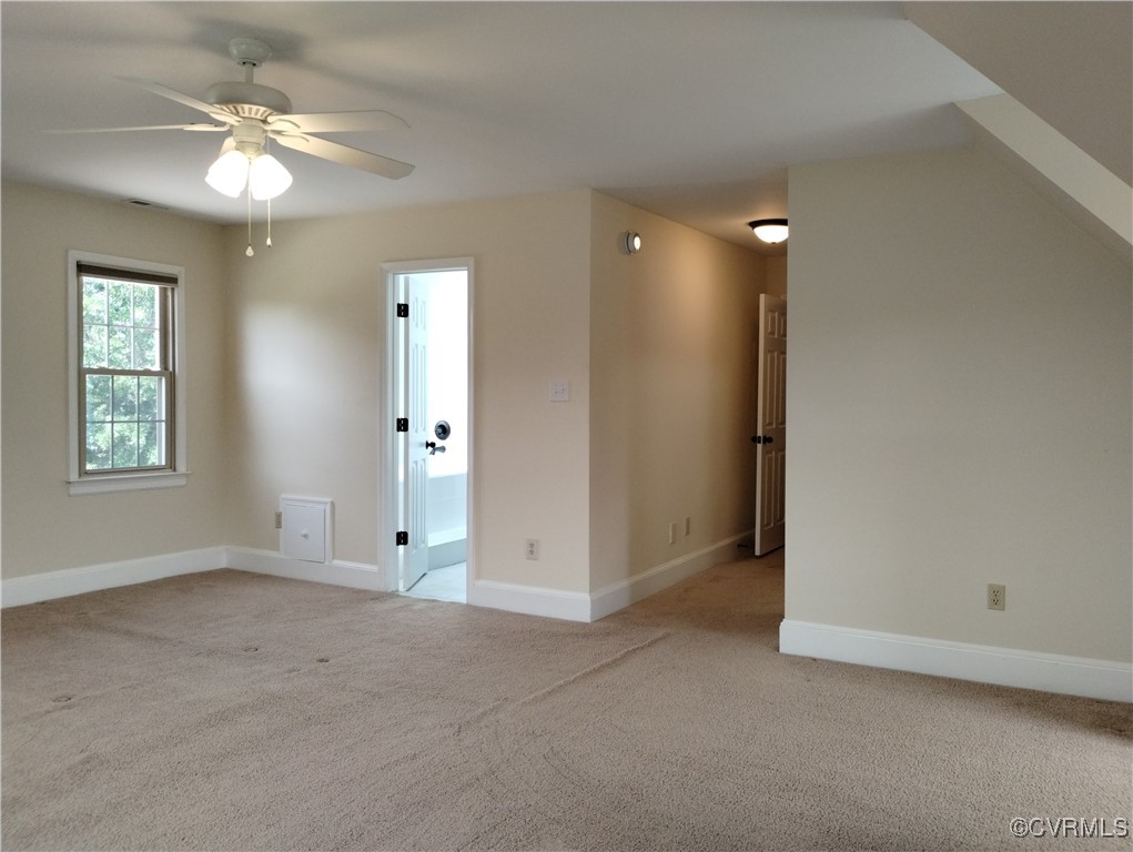 3249 Maidens Road Powhatan, VA 23139 - Photo 26 of 45 Spare room featuring light carpet, a ceiling fan,