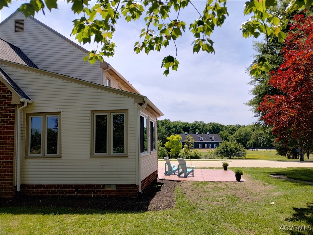 3249 Maidens Road Powhatan, VA 23139 - Photo 3 of 45 View of home's exterior with a lawn