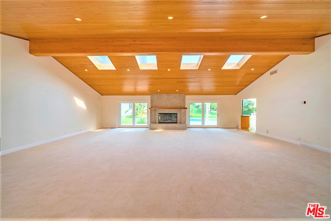 5470 Hoback Glen Road Calabasas, CA 91302 - Photo 3 of 3 a view of an empty room with a window