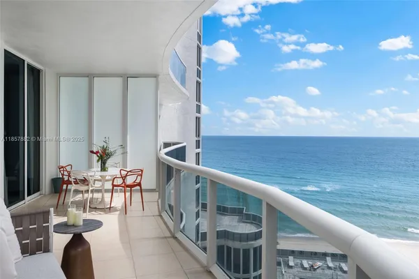 a view of balcony with patio
