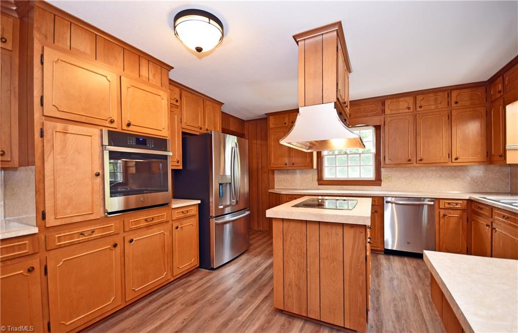 155 Tutterow Road Mocksville, NC 27028 - Photo 12 of 30 New Wall Oven, New Refrigerator, New Dishwasher. Smooth Cooktop Island with Ventilation Hood.