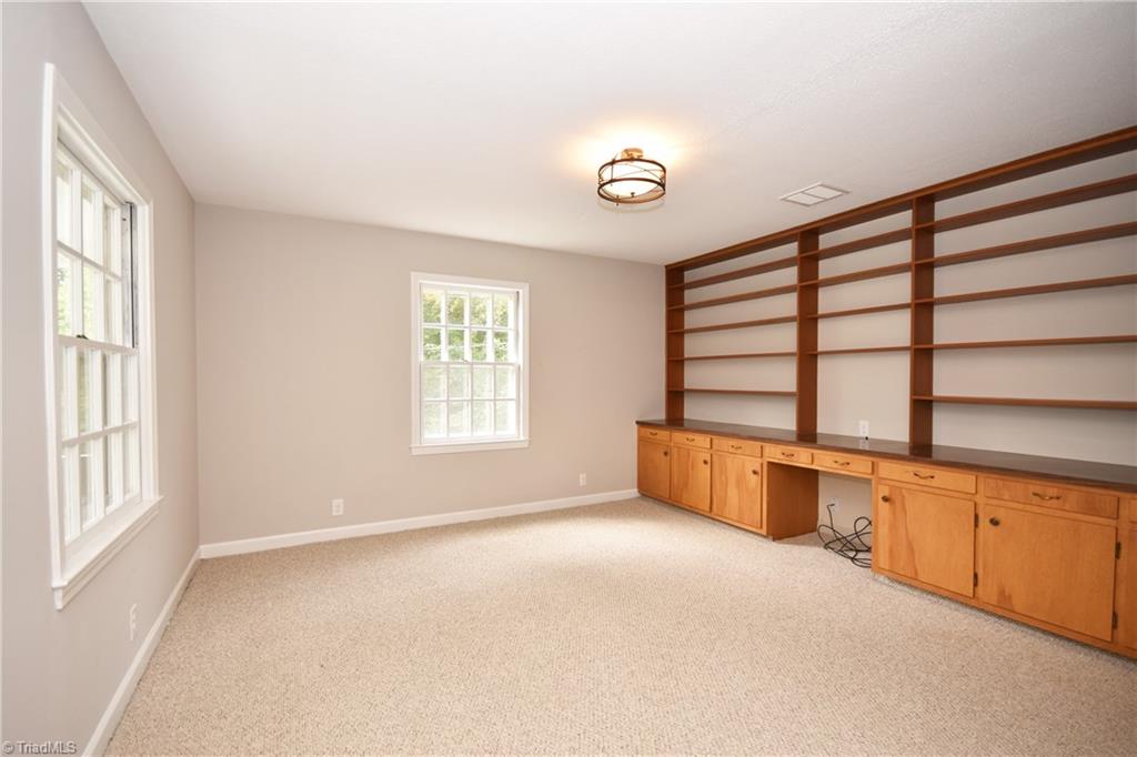 155 Tutterow Road Mocksville, NC 27028 - Photo 21 of 30 Upper Level Study with built-in shelves.