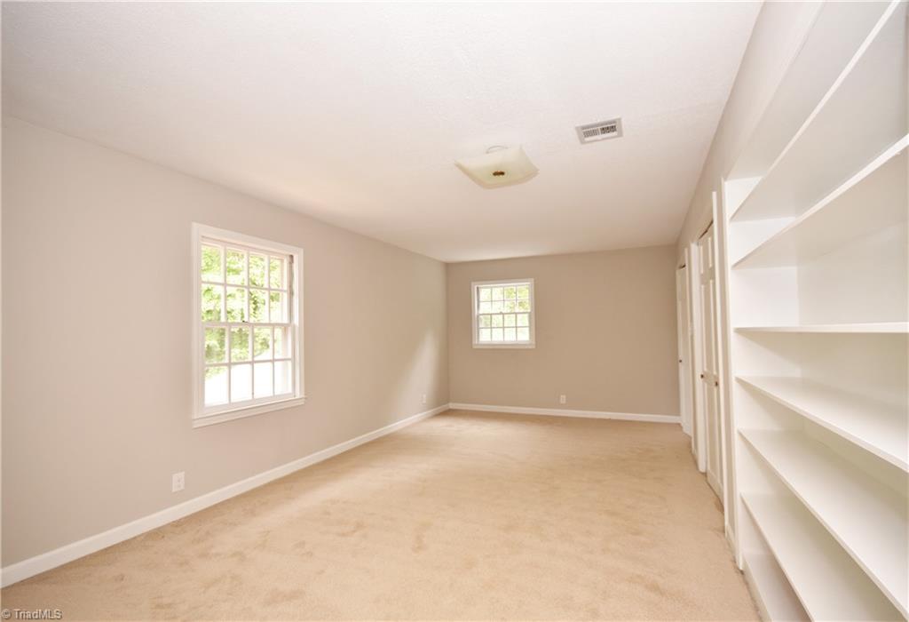 155 Tutterow Road Mocksville, NC 27028 - Photo 22 of 30 Upper Level 3rd Bedroom with Built-In Shelves.