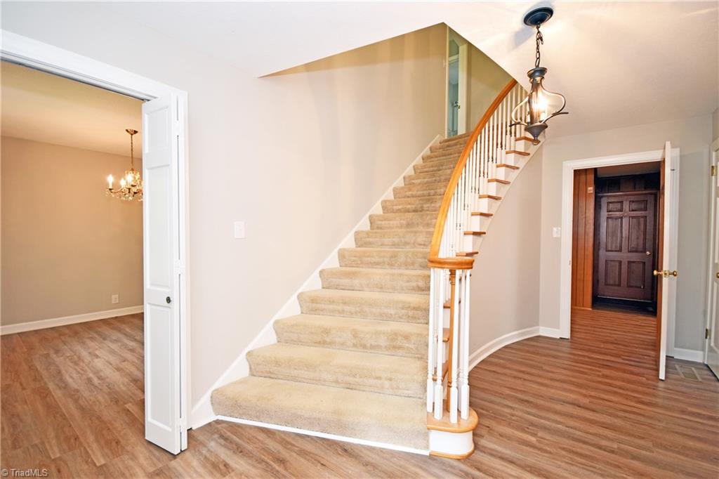 155 Tutterow Road Mocksville, NC 27028 - Photo 6 of 30 Foyer with Curved Staircase