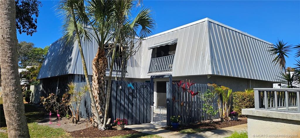 3828 Jefferson Street Stuart, FL 34997 - Photo 1 of 19 a view of a house with street