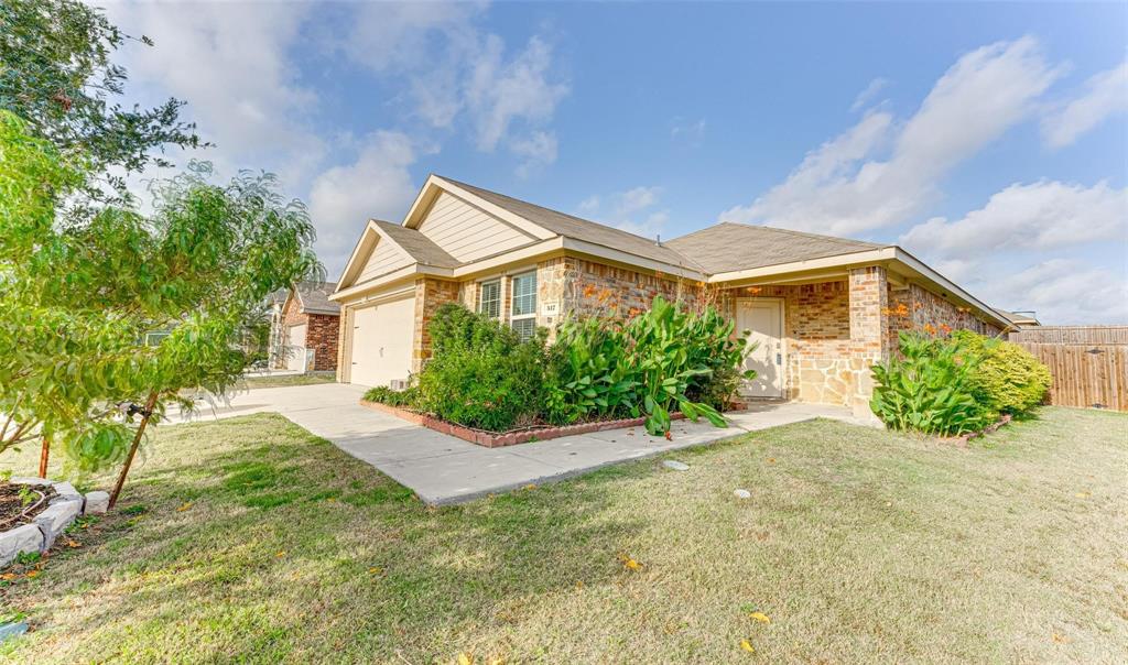 517 Milo Way Royse City, TX 75189 - Photo 32 of 34 Brick and stone veneer exterior with a covered front entry