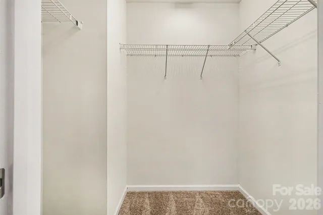 a view of small space with racks on the wall