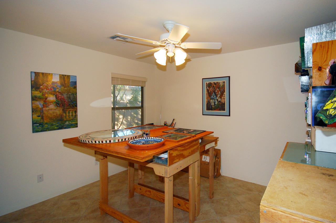 2043 West Tanner Ranch Road Queen Creek, AZ 85144 - Photo 9 of 18 a dining room with furniture and window