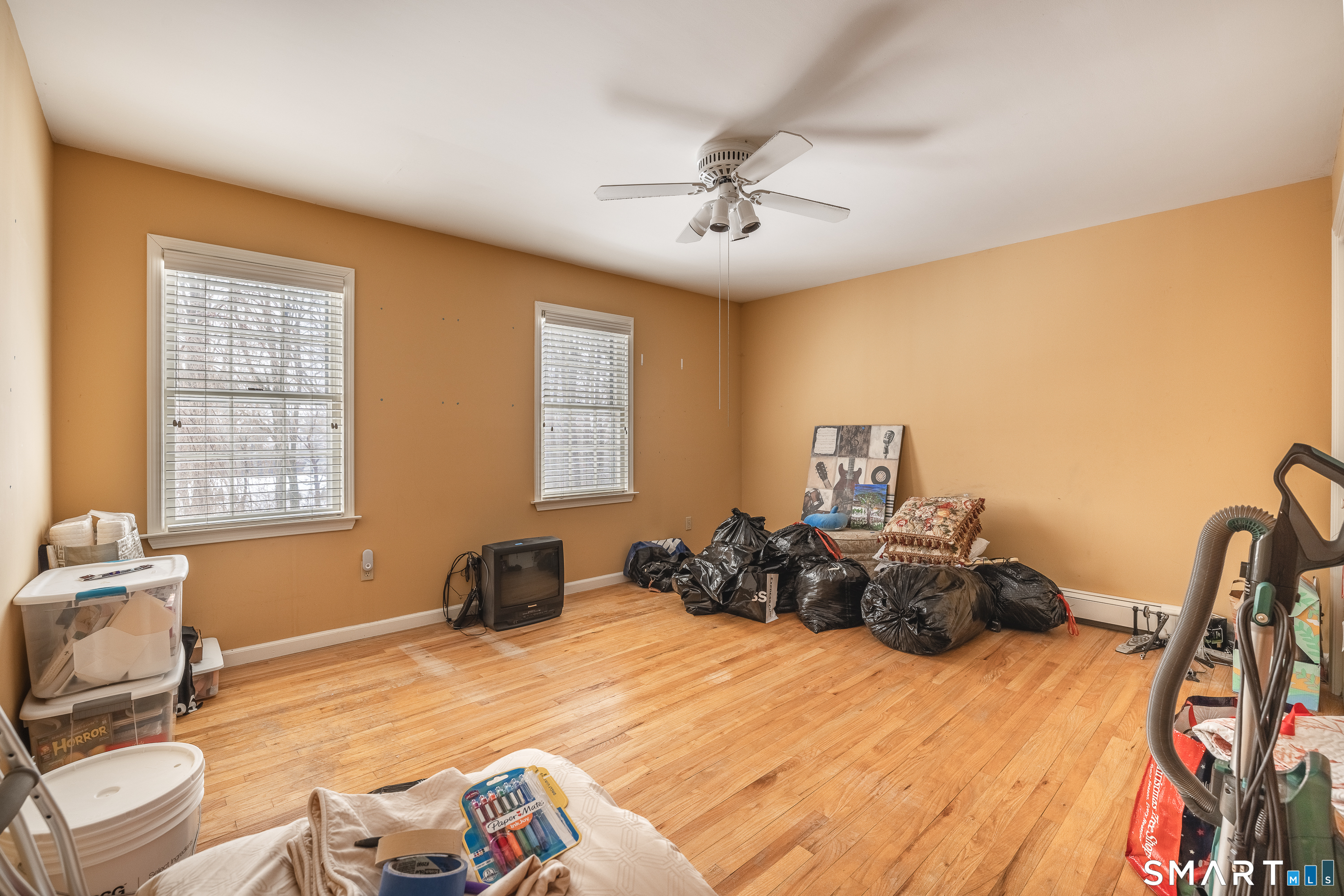 34 Bagburn Hill Road Monroe, CT 06468 - Photo 19 of 28 a bedroom with a bed and wooden floor