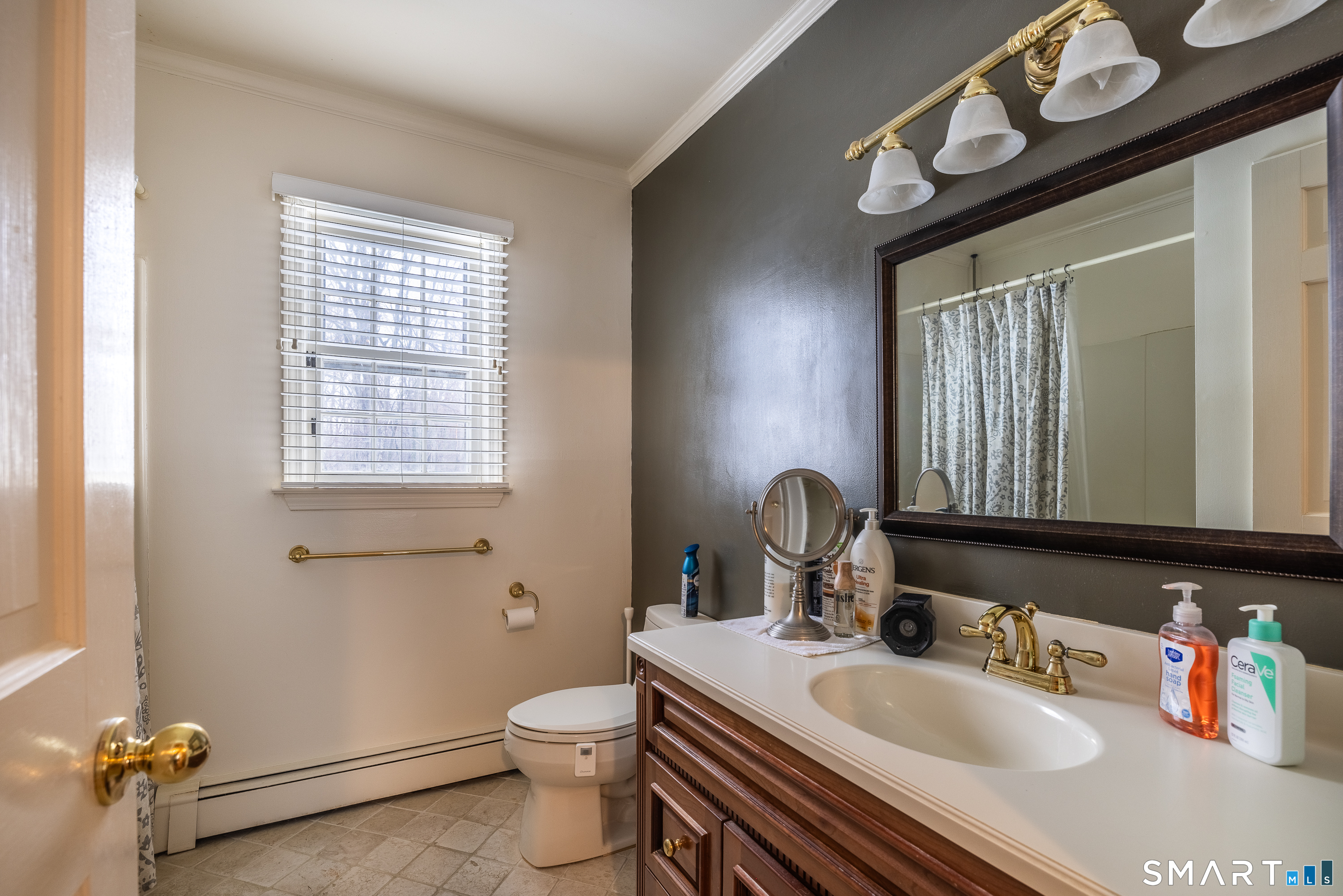 34 Bagburn Hill Road Monroe, CT 06468 - Photo 20 of 28 a bathroom with a sink and a mirror