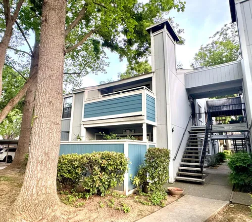 front view of a house with a small yard