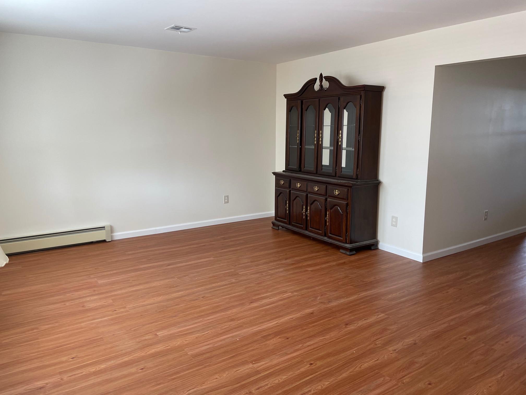 4 Sheridan Road Toms River, NJ 08757 - Photo 3 of 16 a view of a livingroom with wooden floor