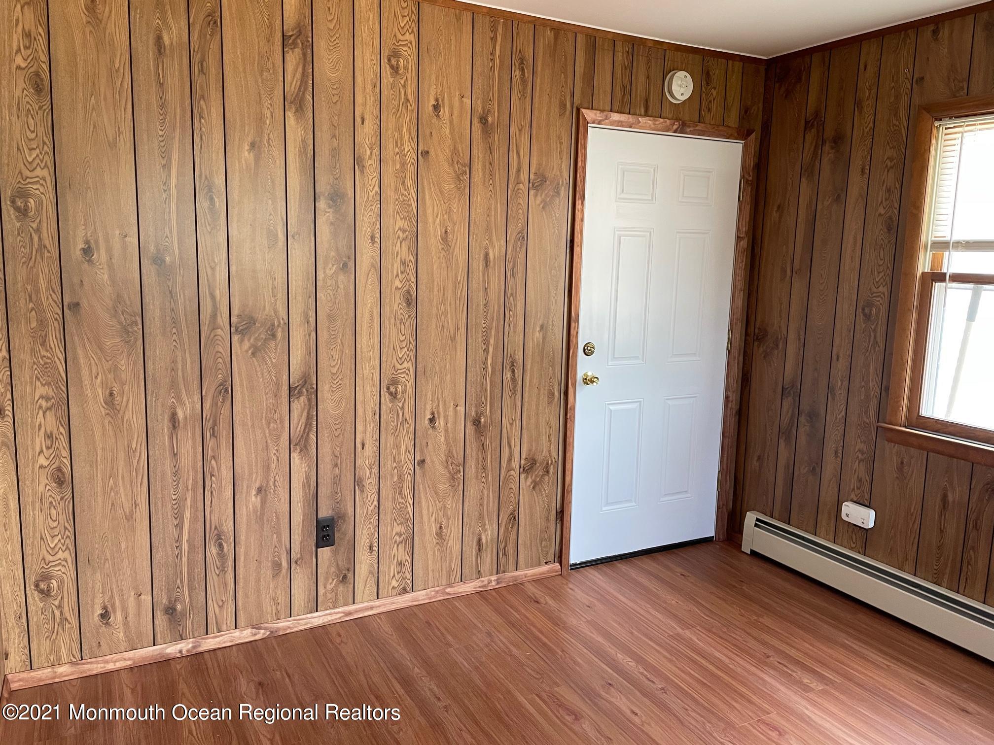 4 Sheridan Road Toms River, NJ 08757 - Photo 10 of 16 a view of a entryway with wooden walls