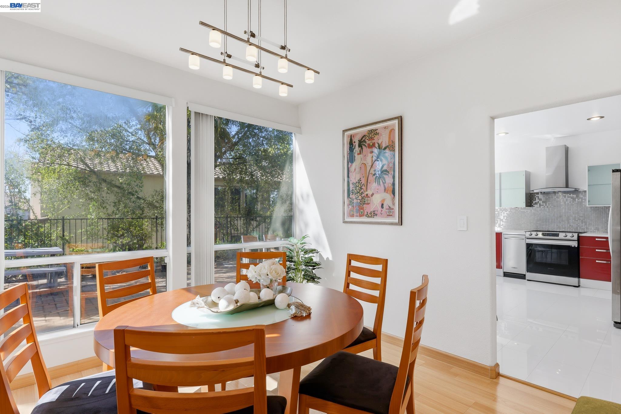 906 Vista Pointe Drive San Ramon, CA 94582 - Photo 18 of 60 a view of a dining room with furniture window and wooden floor