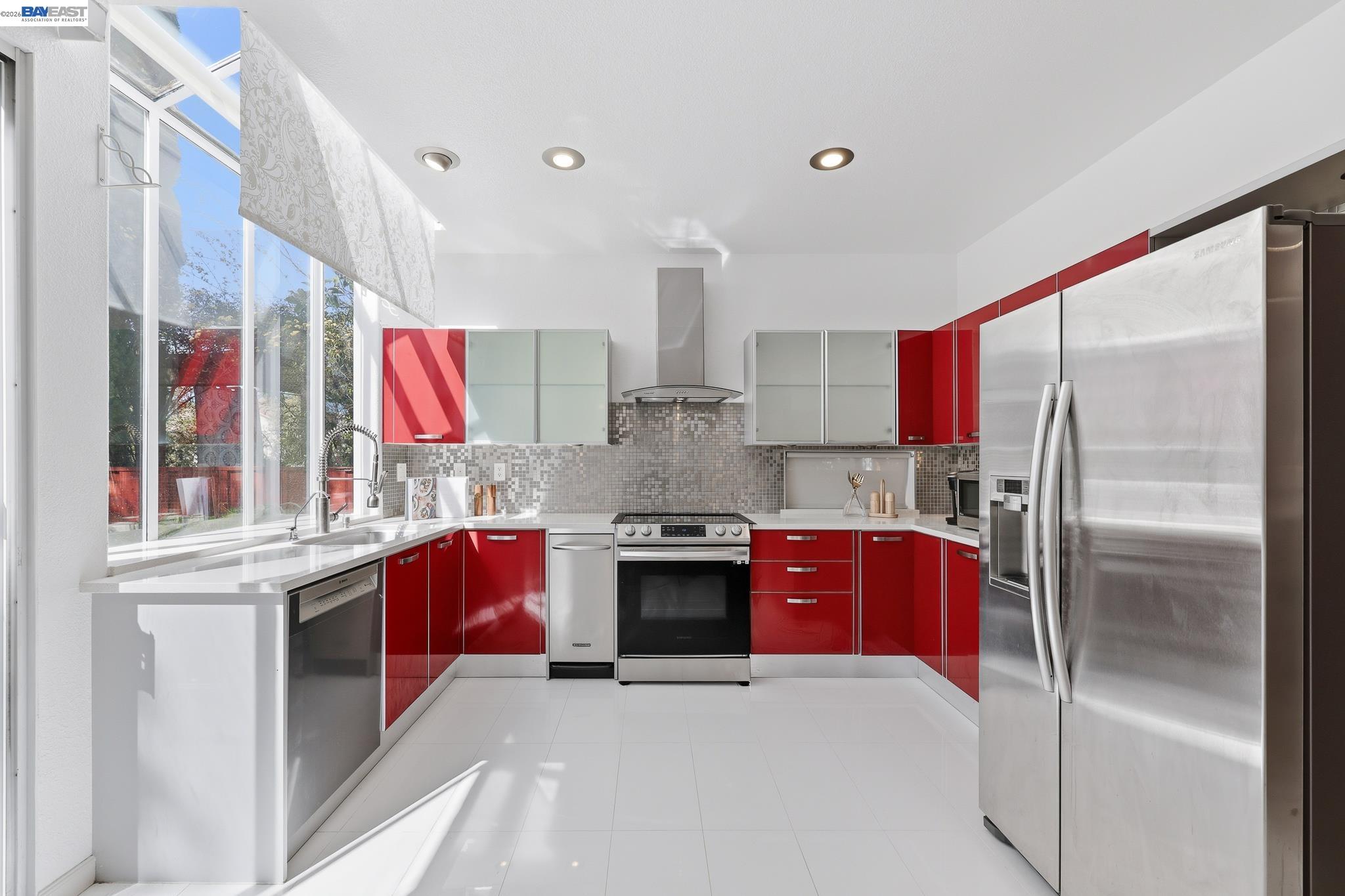 906 Vista Pointe Drive San Ramon, CA 94582 - Photo 22 of 60 a kitchen with stainless steel appliances granite countertop a stove and a refrigerator