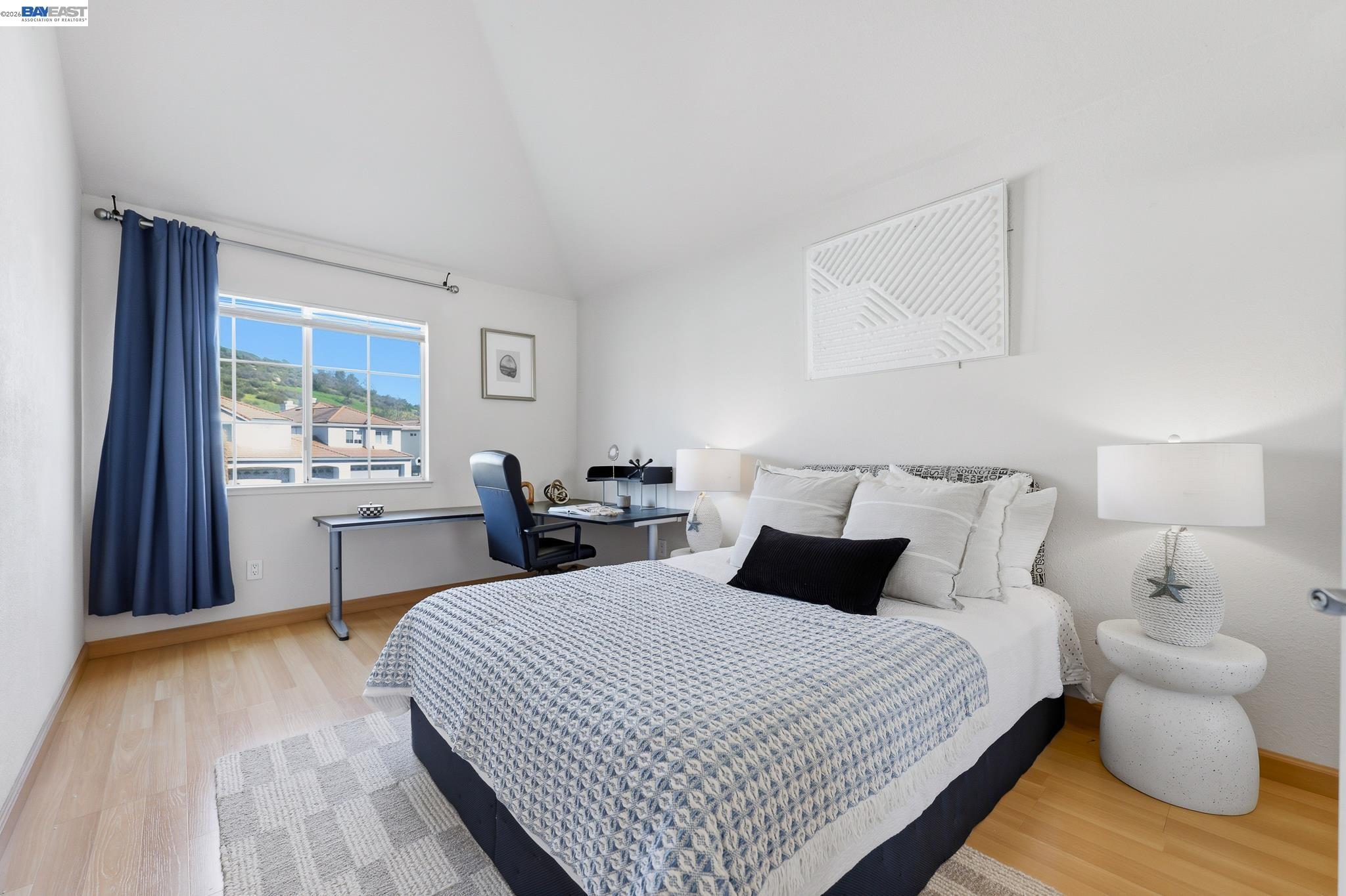 906 Vista Pointe Drive San Ramon, CA 94582 - Photo 35 of 60 a bedroom with a bed and wooden floor