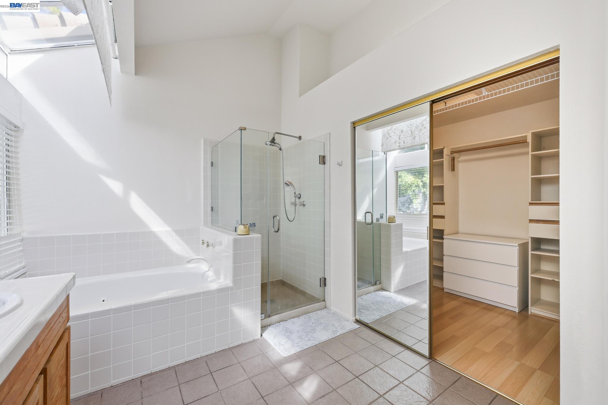 906 Vista Pointe Drive San Ramon, CA 94582 - Photo 48 of 60 a bathroom with a tub and shower