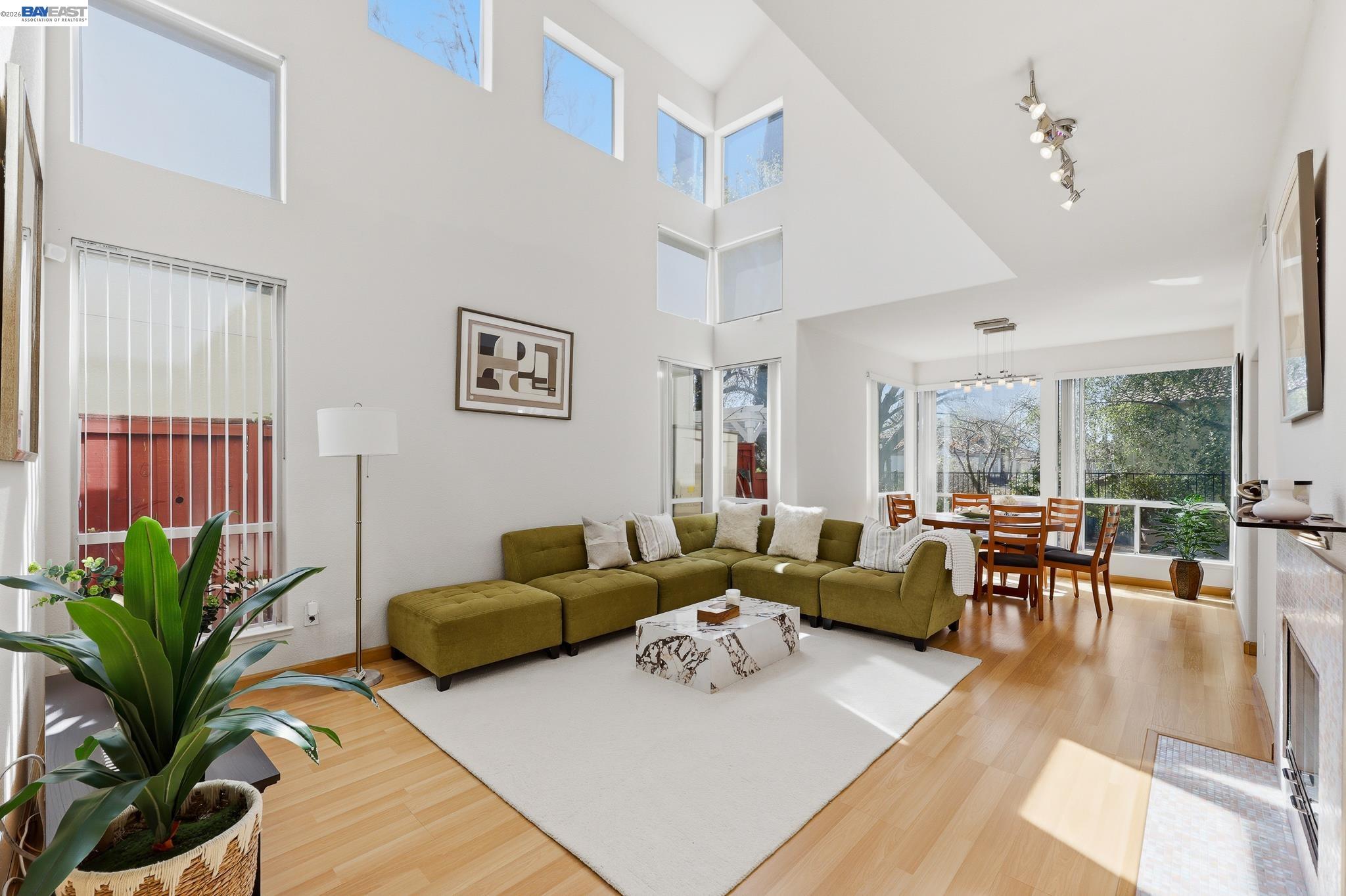 906 Vista Pointe Drive San Ramon, CA 94582 - Photo 5 of 60 a living room with furniture potted plant and a large window