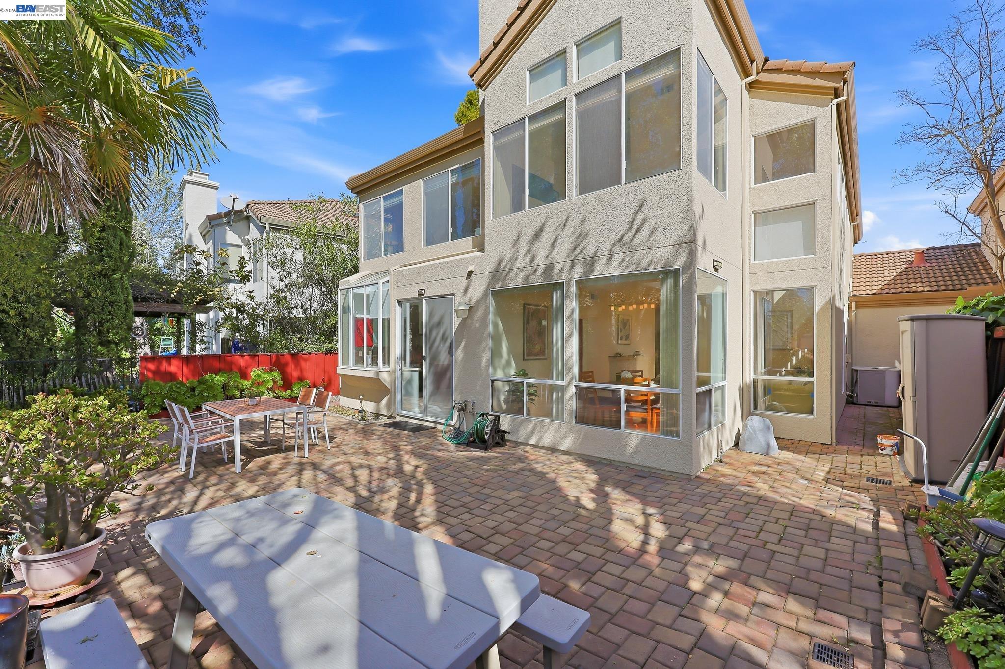 906 Vista Pointe Drive San Ramon, CA 94582 - Photo 53 of 60 a wooden bench sitting in front of building