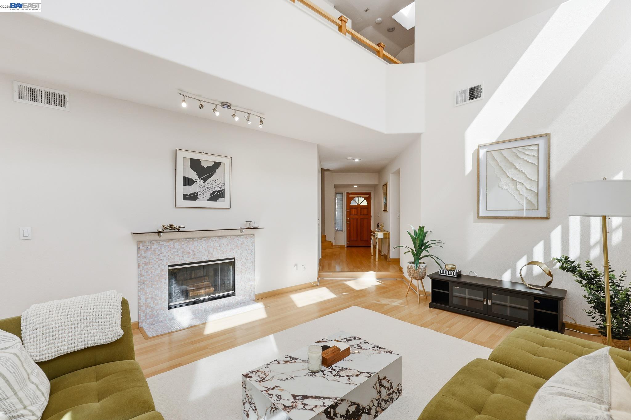 906 Vista Pointe Drive San Ramon, CA 94582 - Photo 8 of 60 a living room with furniture and a fireplace