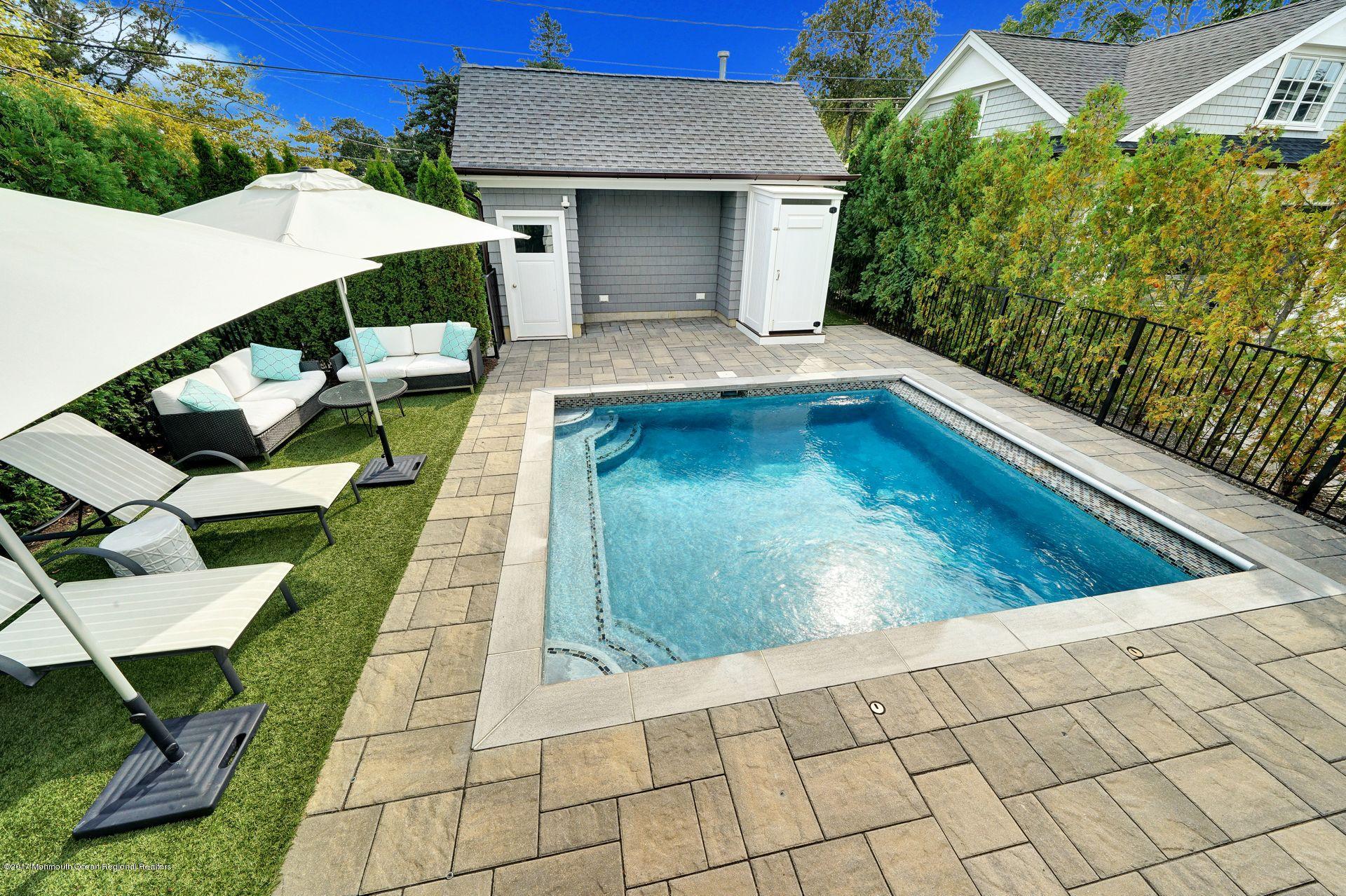 401 Monmouth Avenue Spring Lake, NJ 07762 - Photo 3 of 24 a view of swimming pool with lounge chair