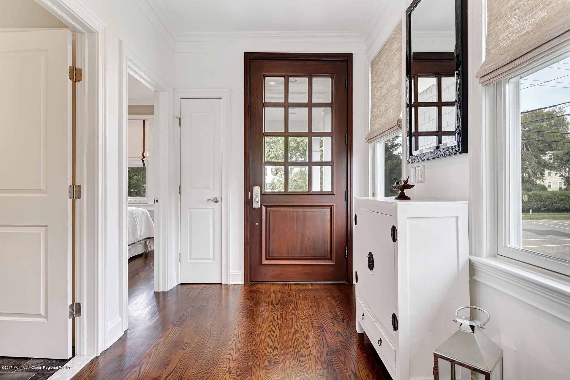 401 Monmouth Avenue Spring Lake, NJ 07762 - Photo 6 of 24 wooden floor in an empty room and a window