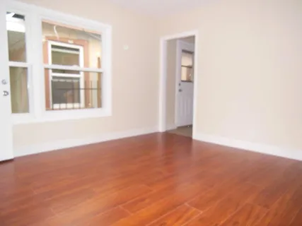 a view of an empty room with a window