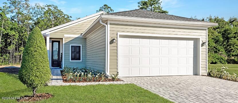 3138 Adelaide Road Green Cove Springs, FL 32043 - Photo 24 of 24 a view of house with garden