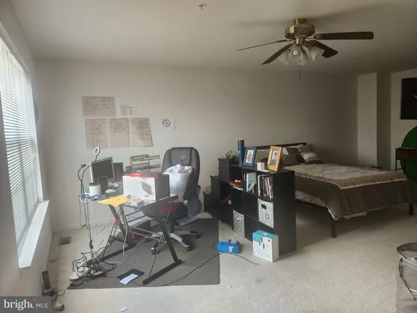 a workspace with furniture and a window