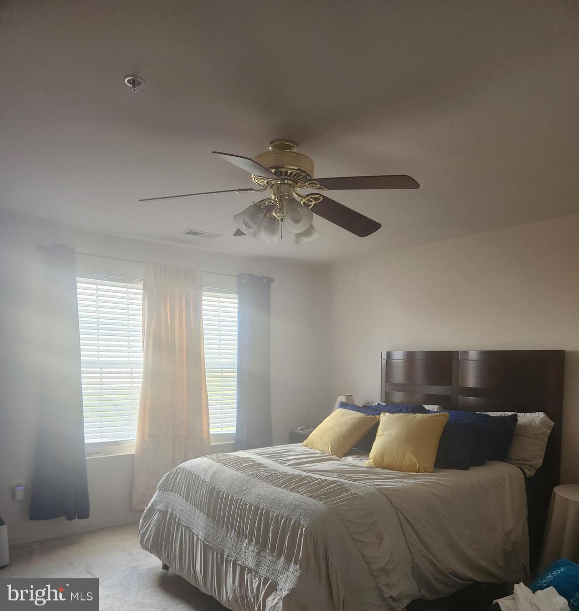 5086 Stapleton Terrace Frederick, MD 21703 - Photo 4 of 24 a bedroom with a bed and window