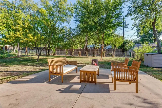 a garden view with a seating space