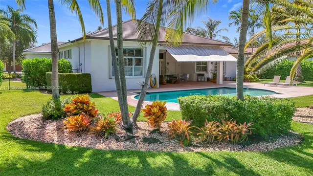a view of a backyard with a garden