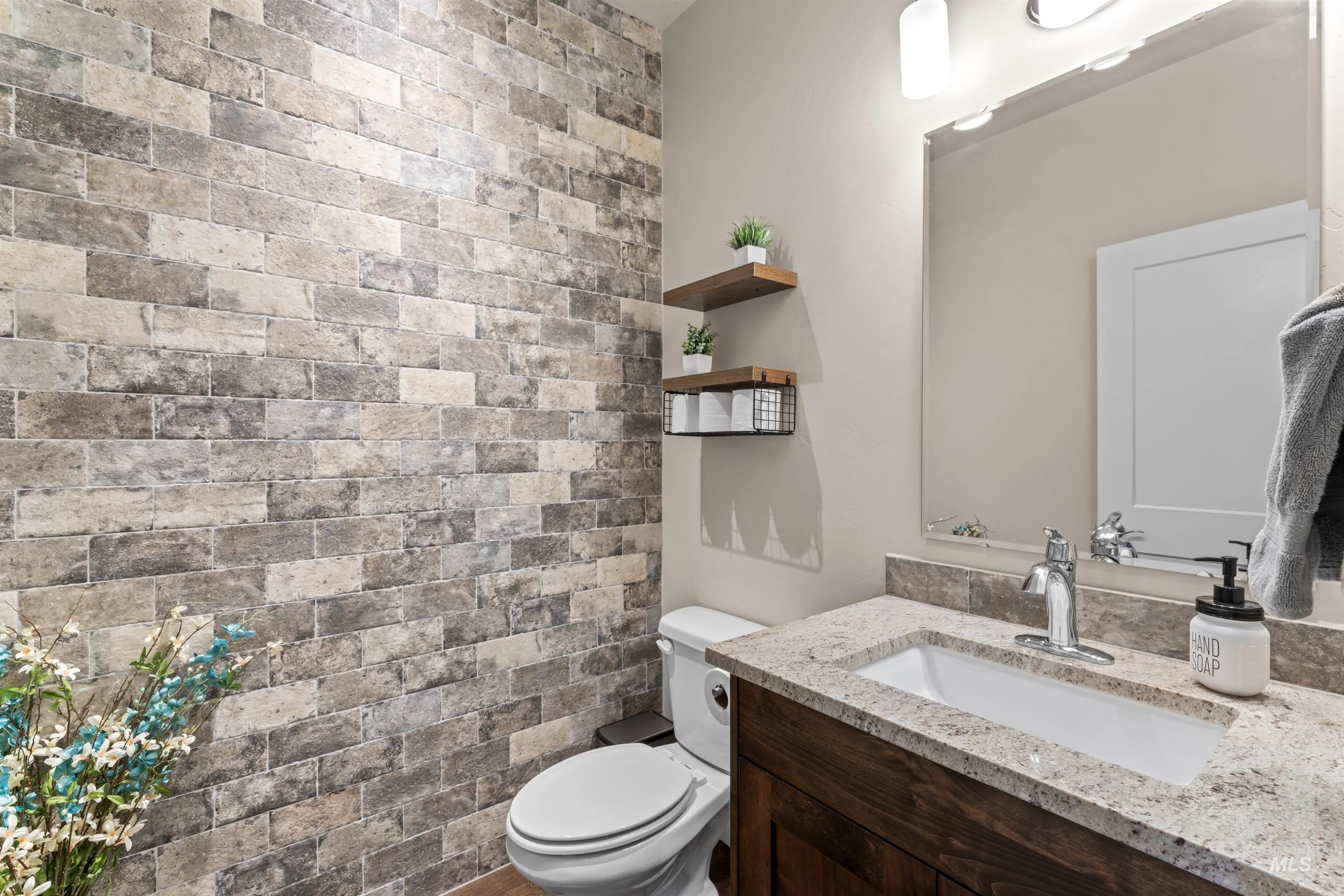 12356 West Rice Road Star, ID 83669 - Photo 33 of 49 Bathroom with toilet and vanity