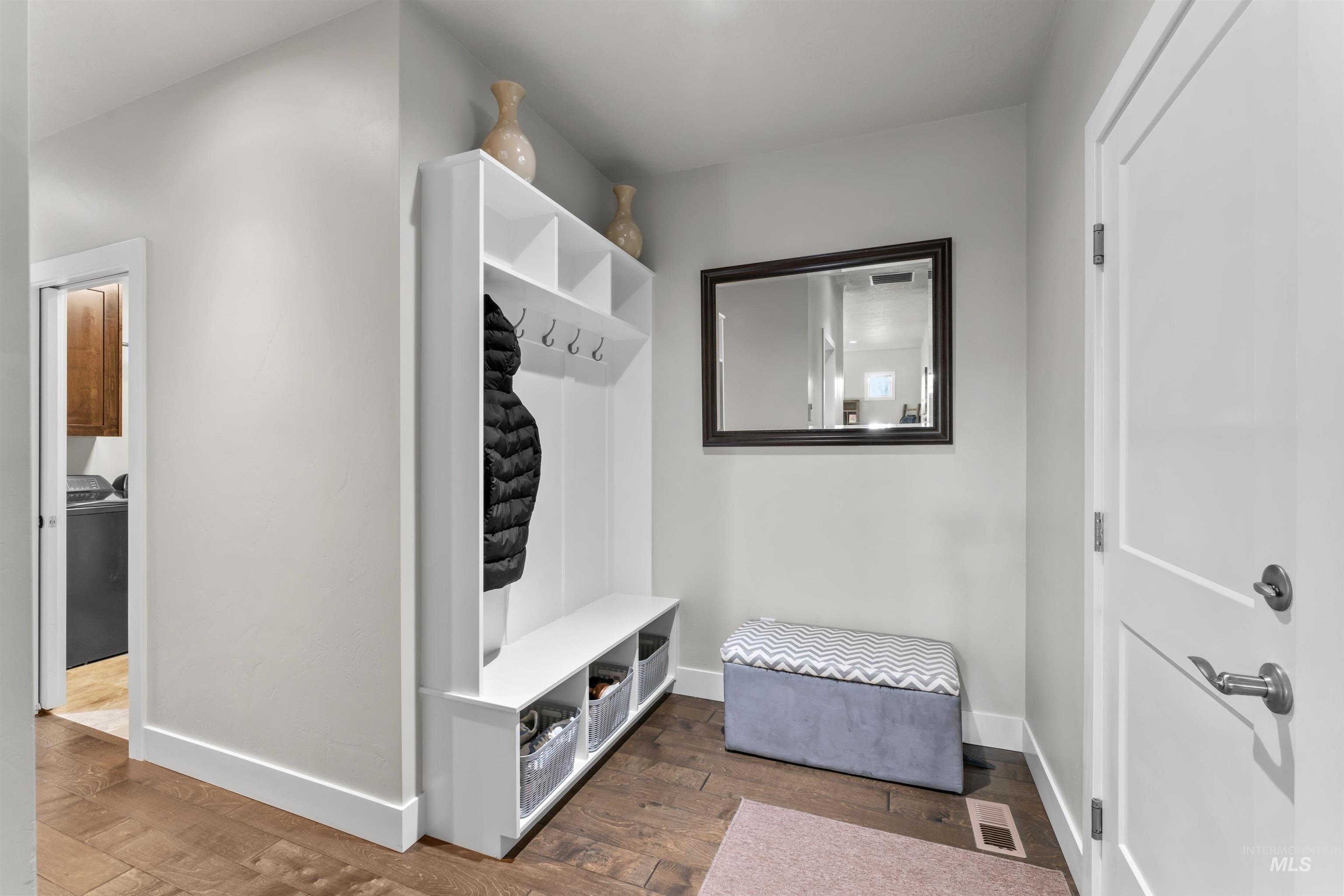 12356 West Rice Road Star, ID 83669 - Photo 37 of 49 Mudroom featuring wood finished floors and baseboards
