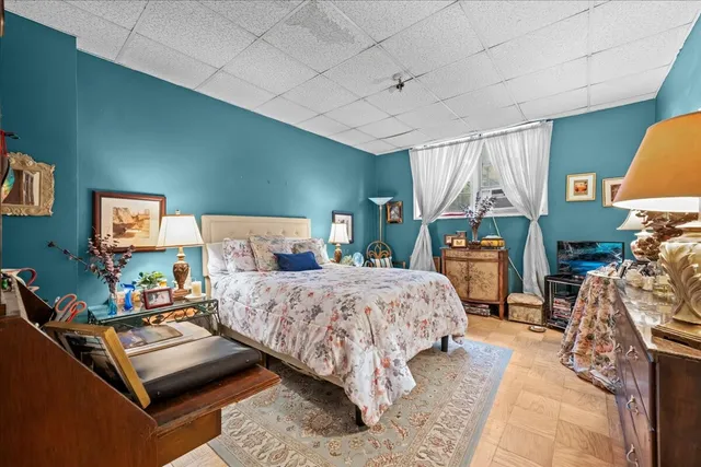 a bathroom with a sink mirror bathtub and toilet