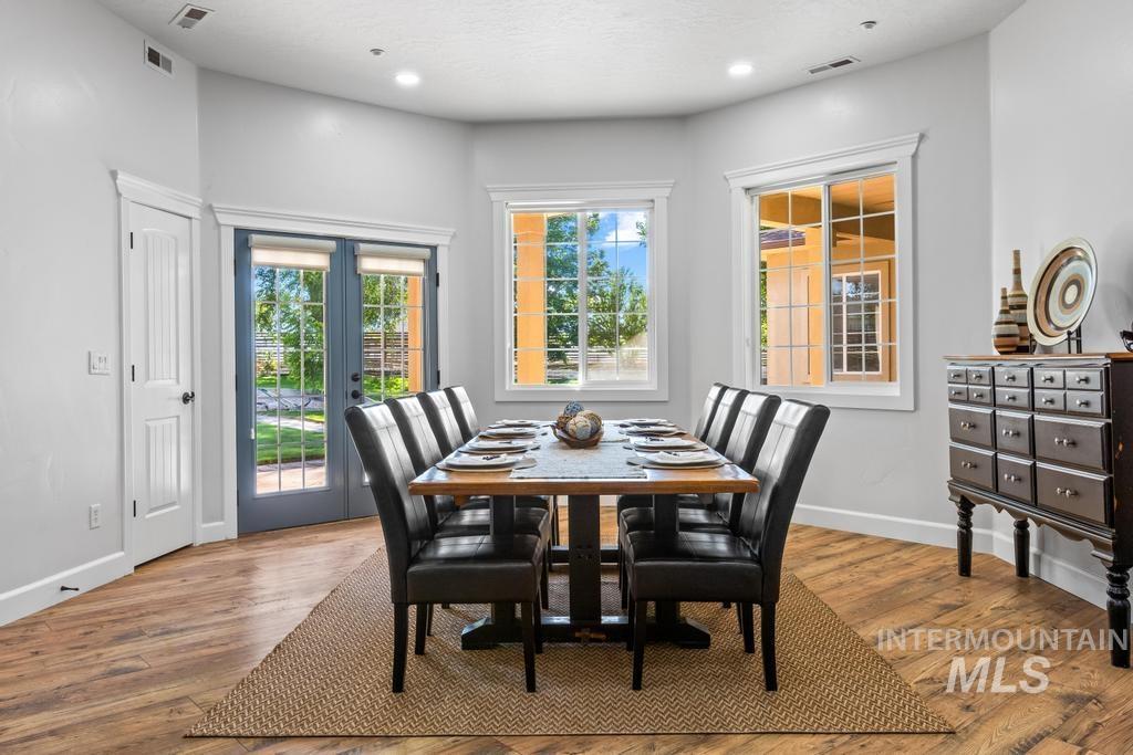 28279 Pearl Road Parma, ID 83660 - Photo 11 of 46 Dining area with light wood-style flooring, french doors, and recessed lighting