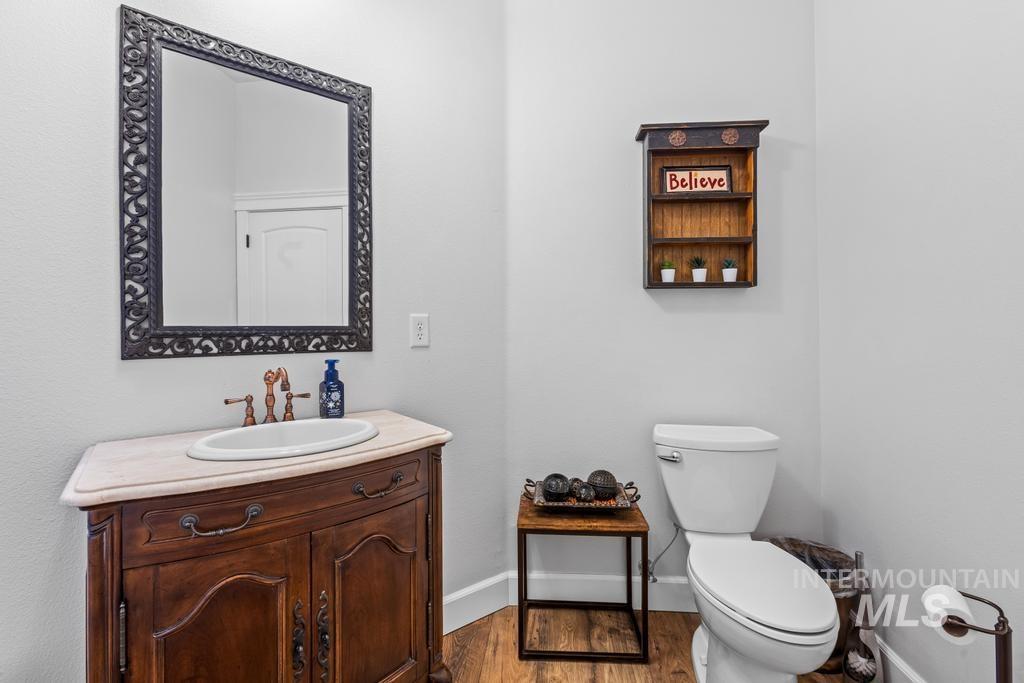 28279 Pearl Road Parma, ID 83660 - Photo 24 of 46 Bathroom with vanity and dark wood-type flooring